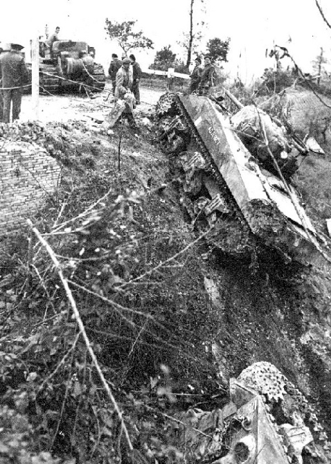 A Canadian Sherman – Adjunct of the Calgary Regiment – driven off the road north of San Leonardo di Ortona, Italy. Source. 